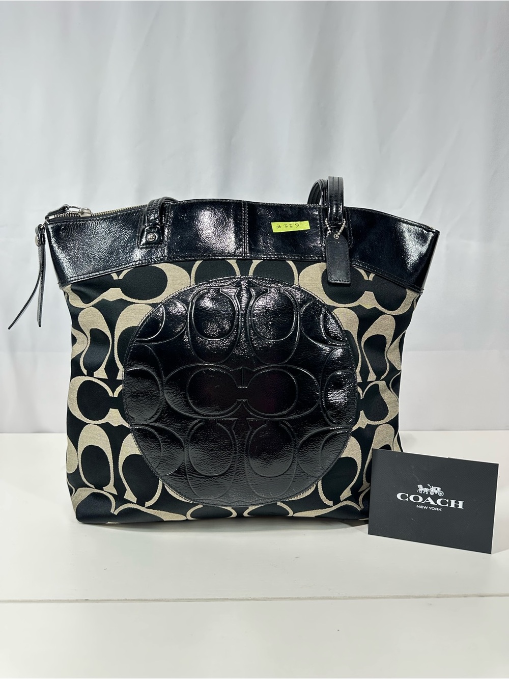 Coach Black and Cream Signature Circle Tote with Patent Accents